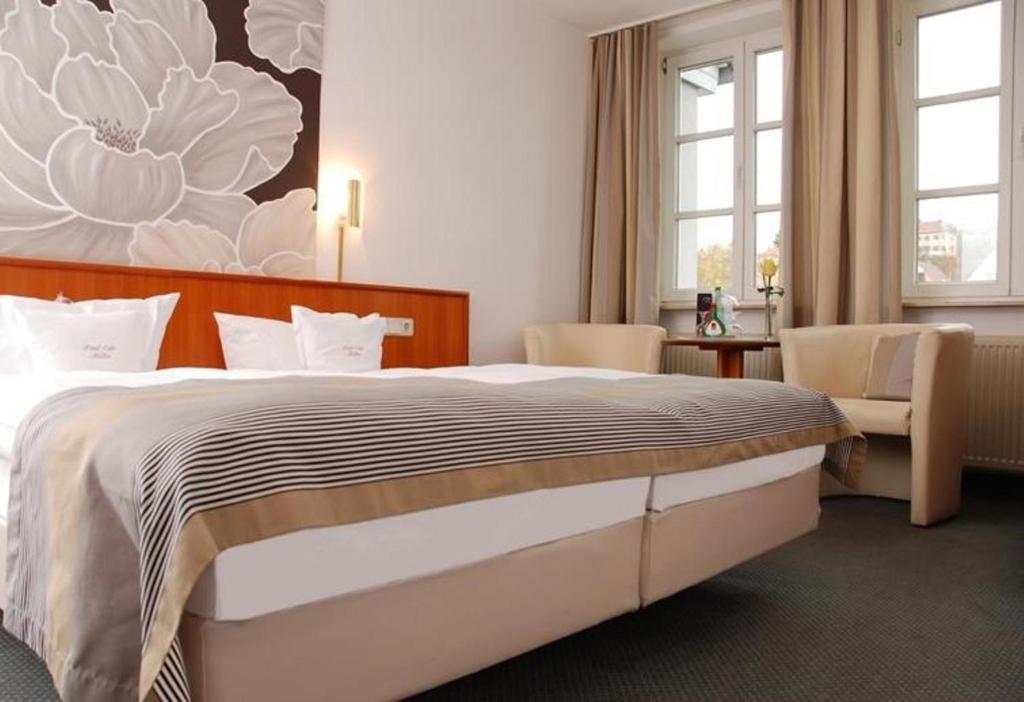 Hotel Muller Cafe & Wein - Mondholzhotel Veitshochheim Bilik gambar